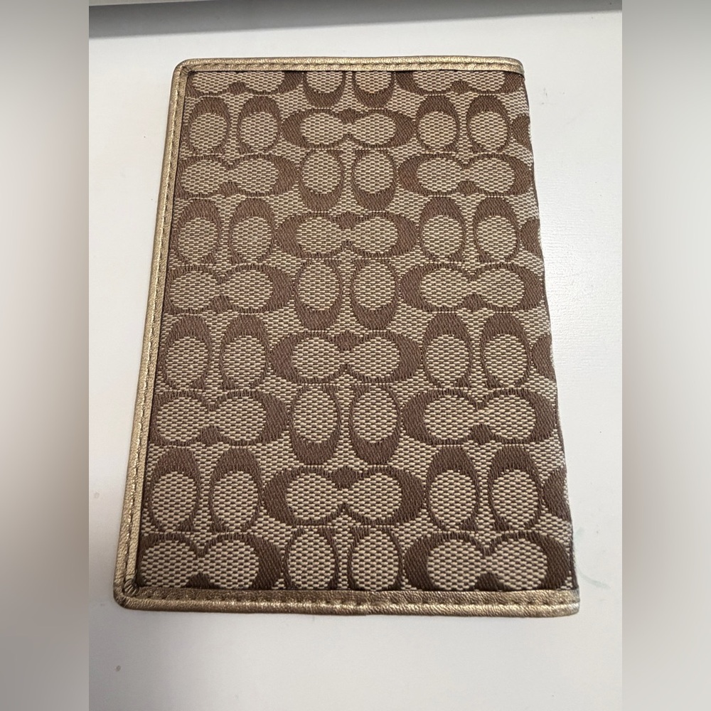 Coach Brown and Tan Signature Passport Holder